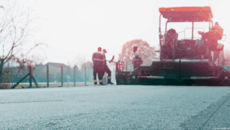 workers-placing-new-coating-asphalt-road-BIG-with-image-credit